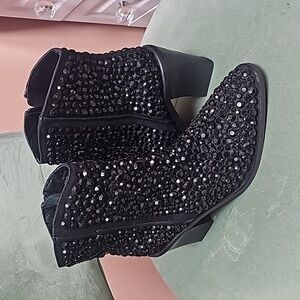 Free People black zipper booties